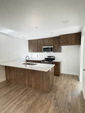This is the exact kitchen on this plan with 3cm quartz countertops