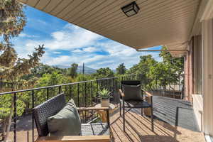 Balcony featuring a mountain view