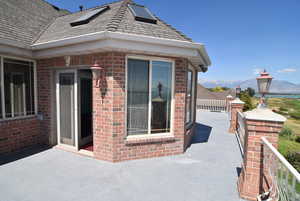 View of patio / terrace with a mountain view