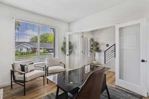 Office featuring wood finished floors and baseboards