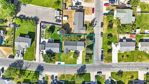 Aerial perspective of suburban area with property parcel outlined