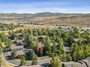 Aerial perspective of suburban area featuring mountains