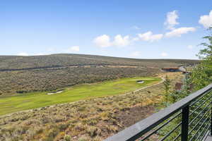 View of mountain background with a golf course