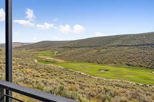 View of mountain background with a golf club