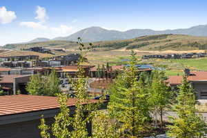 Mountain view featuring nearby suburban area