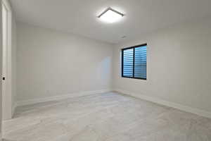 Spare room with baseboards