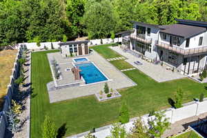 View from above of property featuring a pool area