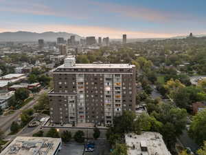 Aerial view at dusk of a city view and a mountain view