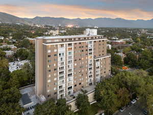 Property at dusk featuring a mountain view