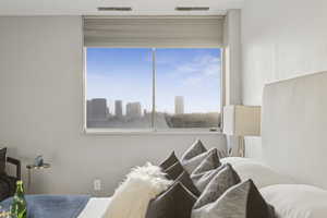 Bedroom featuring a view of city