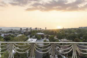 Balcony featuring a skyline view