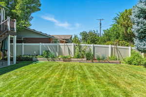 View of yard featuring a garden