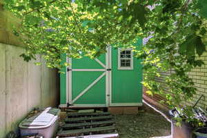 View of shed with entry steps