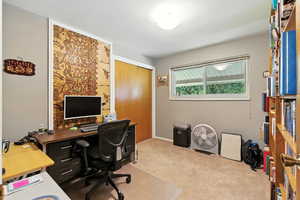 Office featuring light carpet
