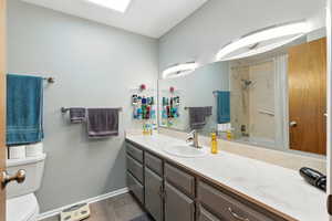 Bathroom with shower / tub combo and vanity