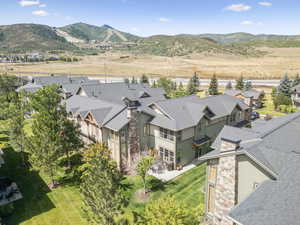 Aerial view of residential area featuring a mountain backdrop
