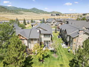 Aerial view of residential area featuring mountains