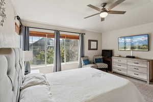 Bedroom with carpet floors and ceiling fan