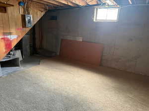 Below grade area with electric panel