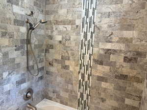 Full bathroom with shower / washtub combination