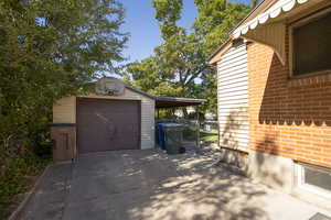 Garage with a garage and driveway