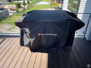 Wooden terrace with area for grilling