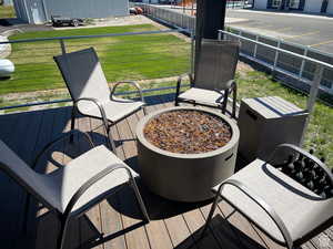 Wooden deck with an outdoor fire pit