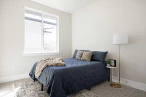 Bedroom featuring baseboards