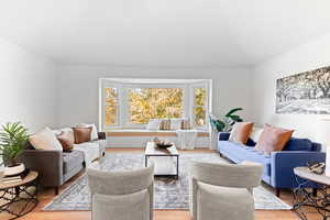 Living area featuring wood finished floors
