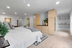 Bedroom featuring recessed lighting and light carpet