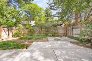 View of fenced backyard