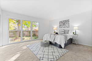 Carpeted bedroom with baseboards
