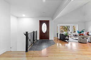 Entrance foyer featuring light wood finished floors and recessed lighting
