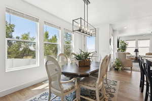 Plenty of entertainment space, gorgeous lighting and no lack of sunshine lighting up the room!