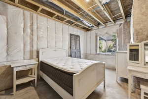 Bedroom on basement level with above grade window.