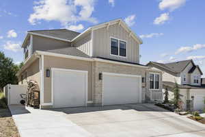 Homeowner extended concrete driveway pad for expanded parking.