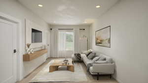 Living area featuring recessed lighting and light wood finished floors