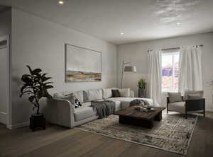 Living room featuring wood finished floors and recessed lighting