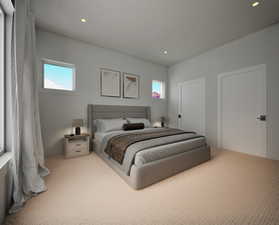 Bedroom with recessed lighting and light colored carpet