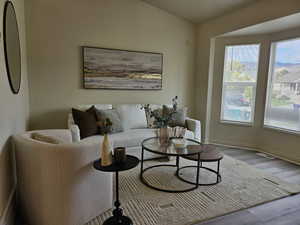Living area with wood finished floors