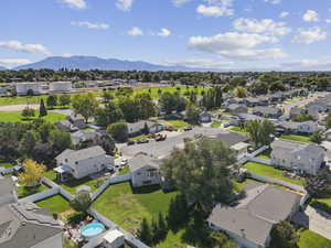 Aerial view of residential area with a mountainous background