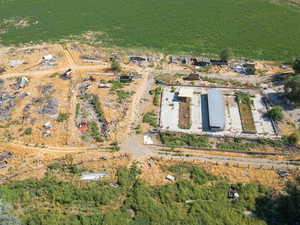 Aerial view of property and surrounding area with rural landscape
