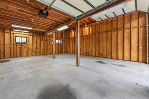 Garage featuring a garage door opener