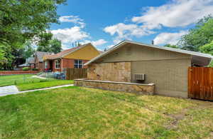 Back of property with brick siding