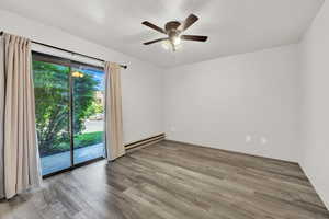 Bedroom with sliding glass door to walkout patio