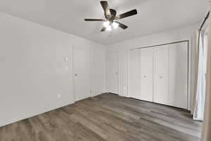 Bedroom featuring closet doors.