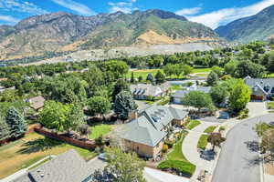 Aerial view of residential area featuring mountains