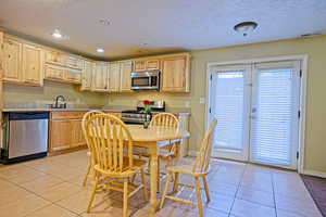 Kitchen and Dining area by the entrance in the basement