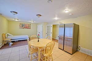 Family space by the dining area or an accessible bed for whoever might need one.