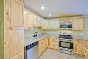 Plenty of cabinet space in the full kitchen downstairs